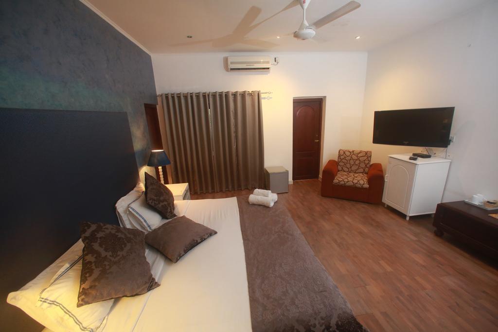 The Canes Boutique Hotel Коломбо Номер фото